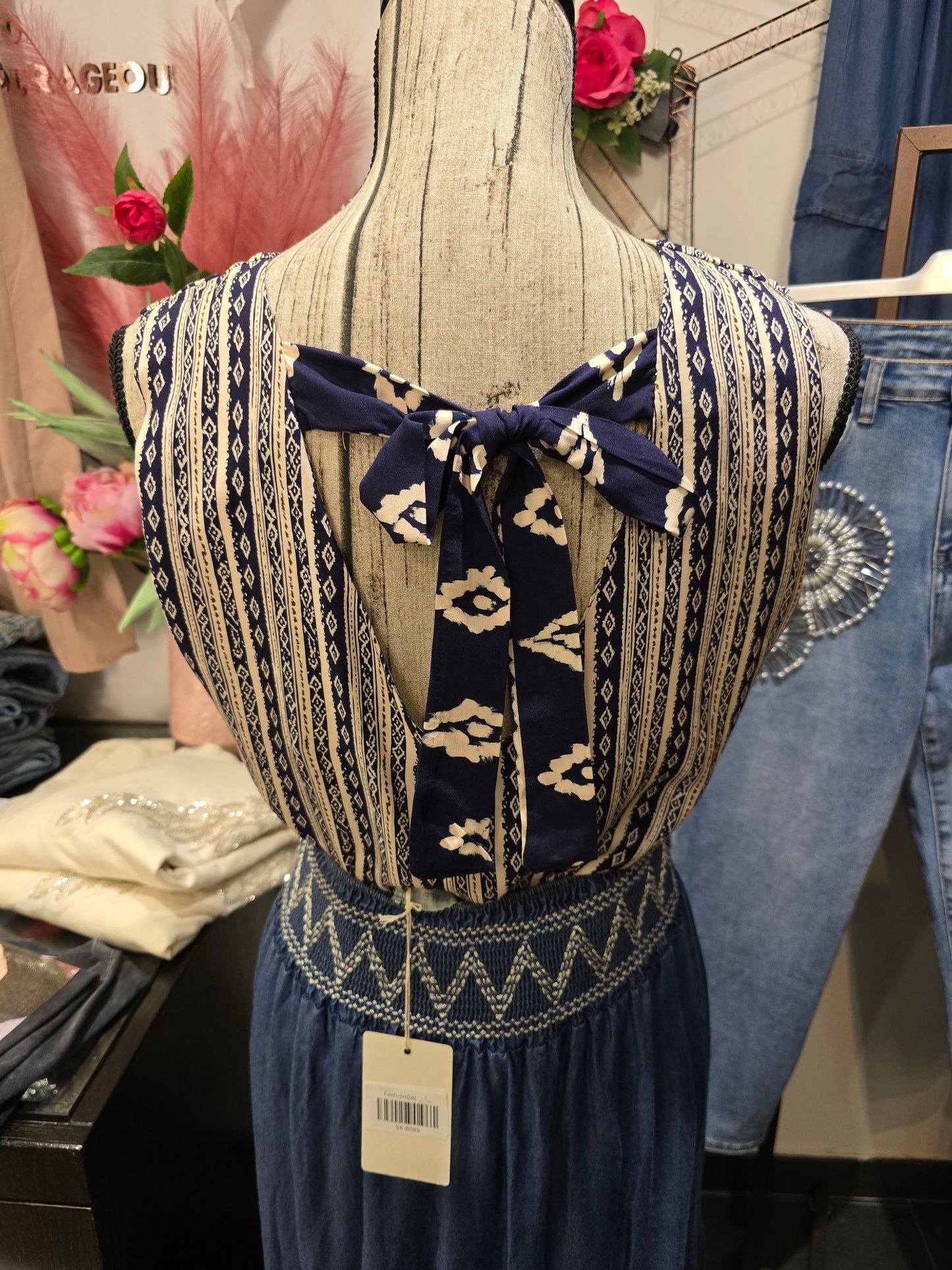 Blusa fantasia con fiocco blu