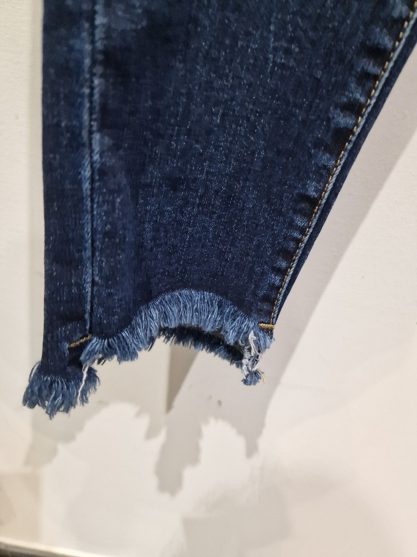 Jeans skinny frangiato