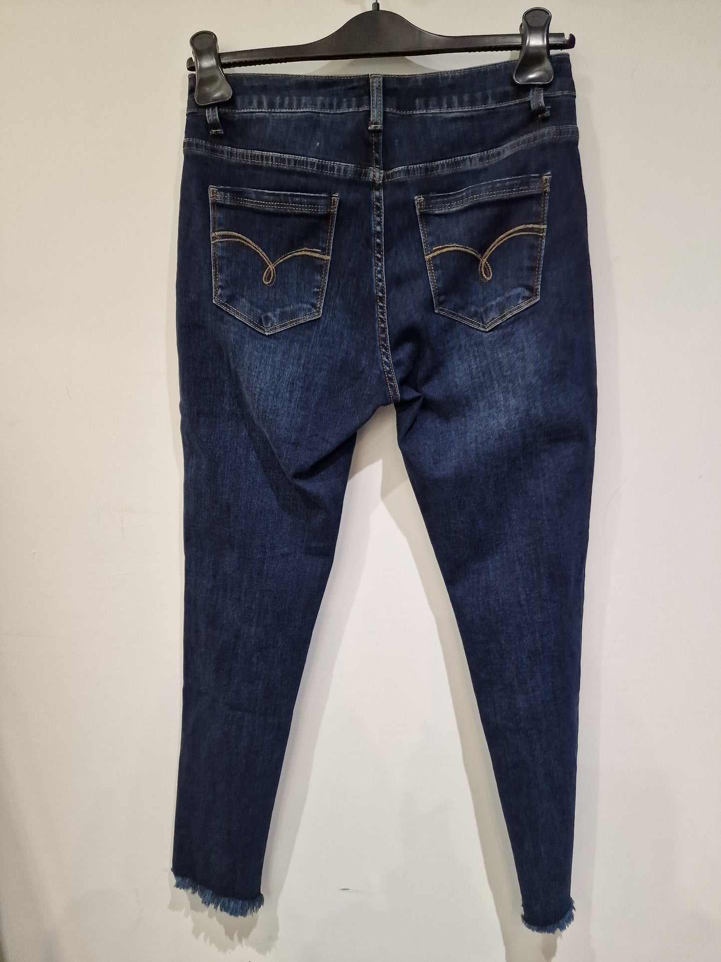 Jeans skinny frangiato