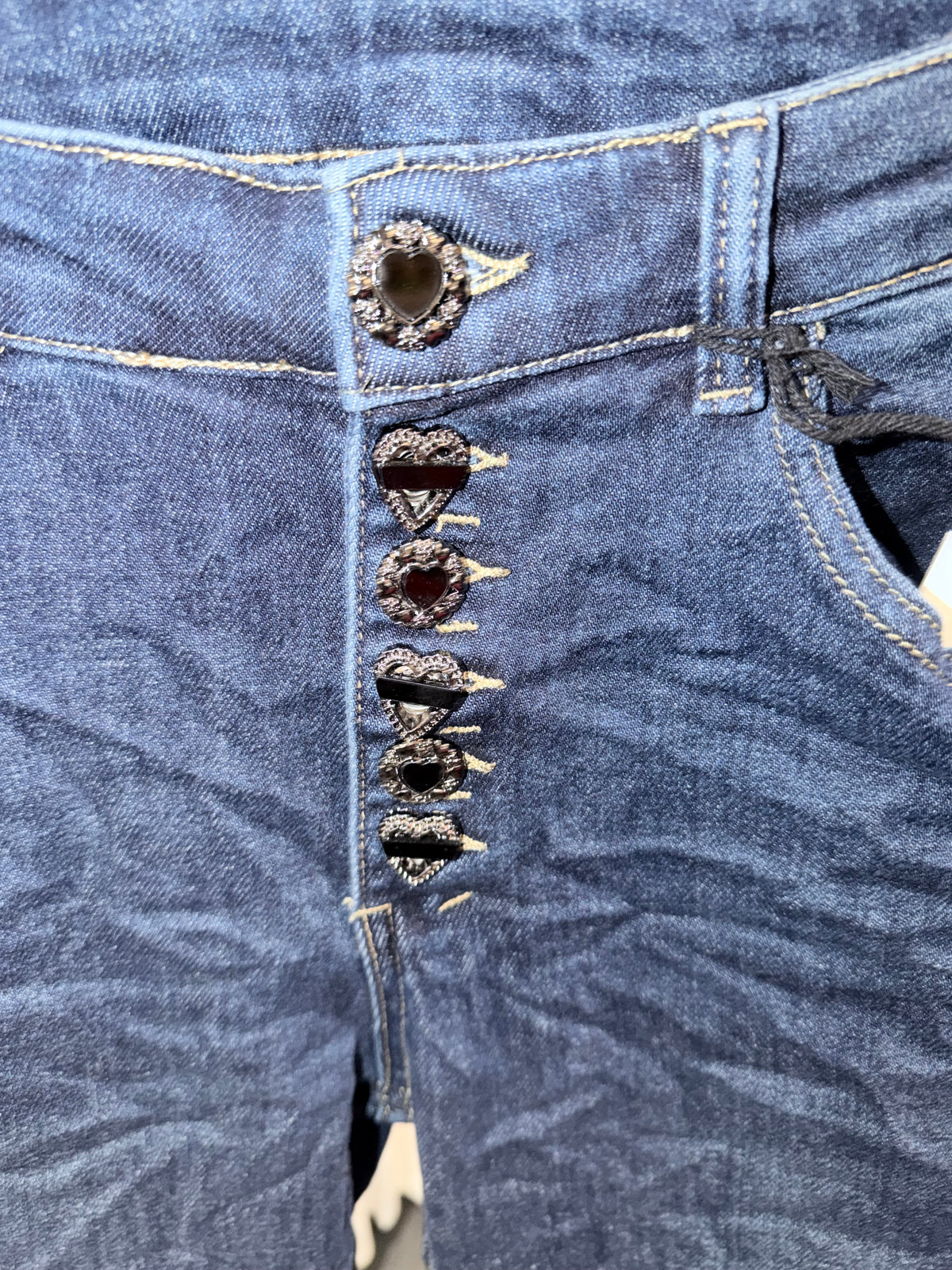 Jeans skinny bottoni gioiello