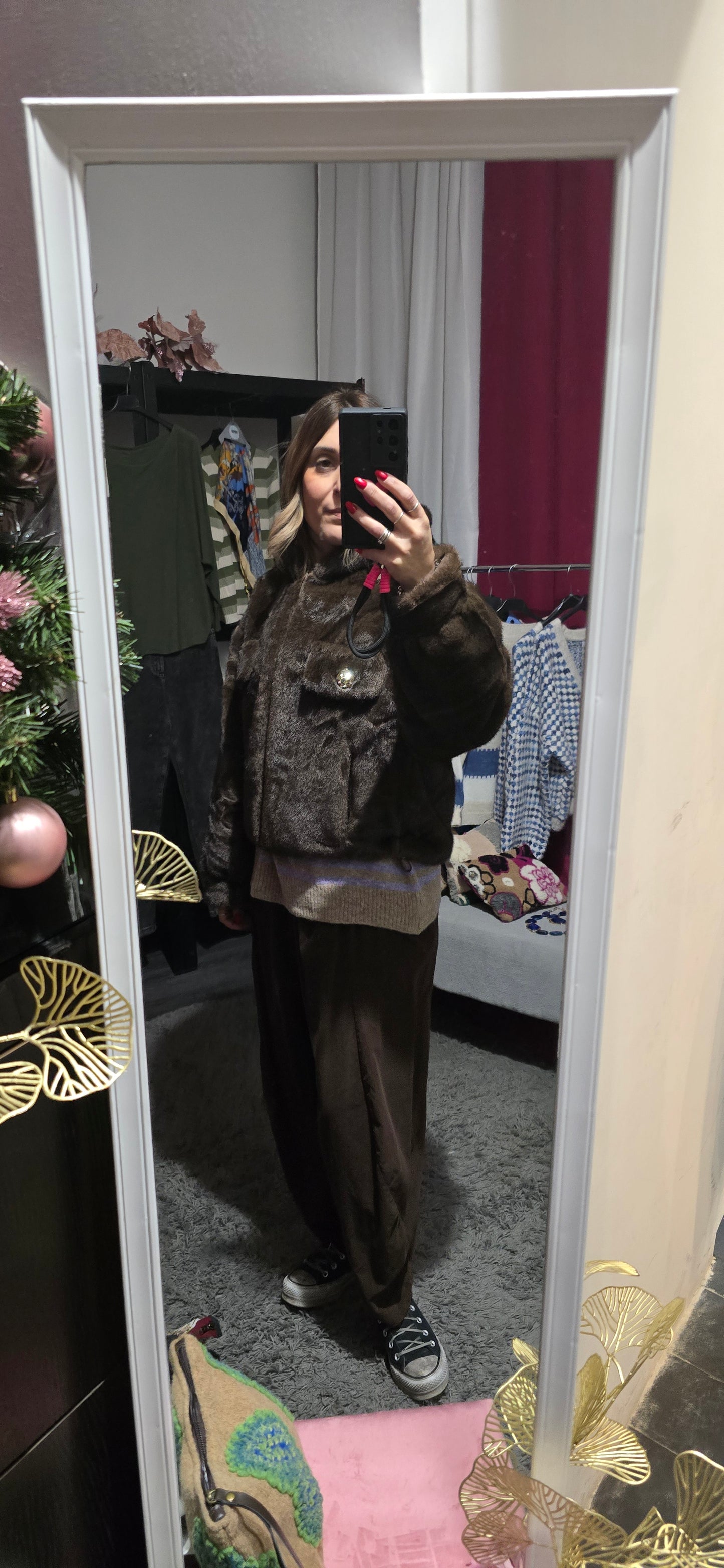 Pellicciotto eco moro con cappuccio