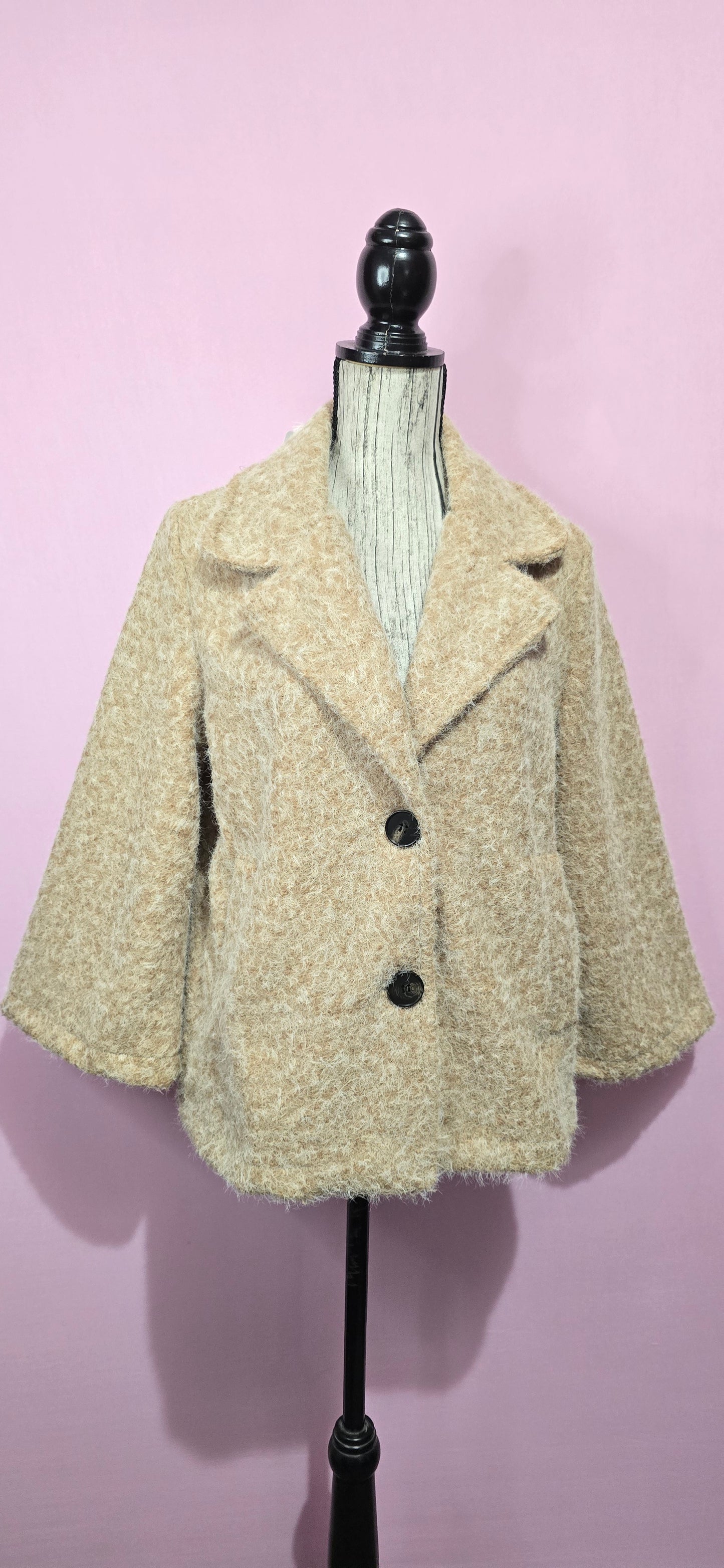 Cappottino corto bouclè camel