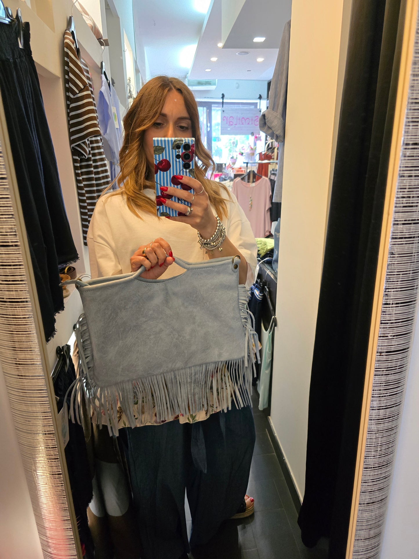 Borsa frange celeste