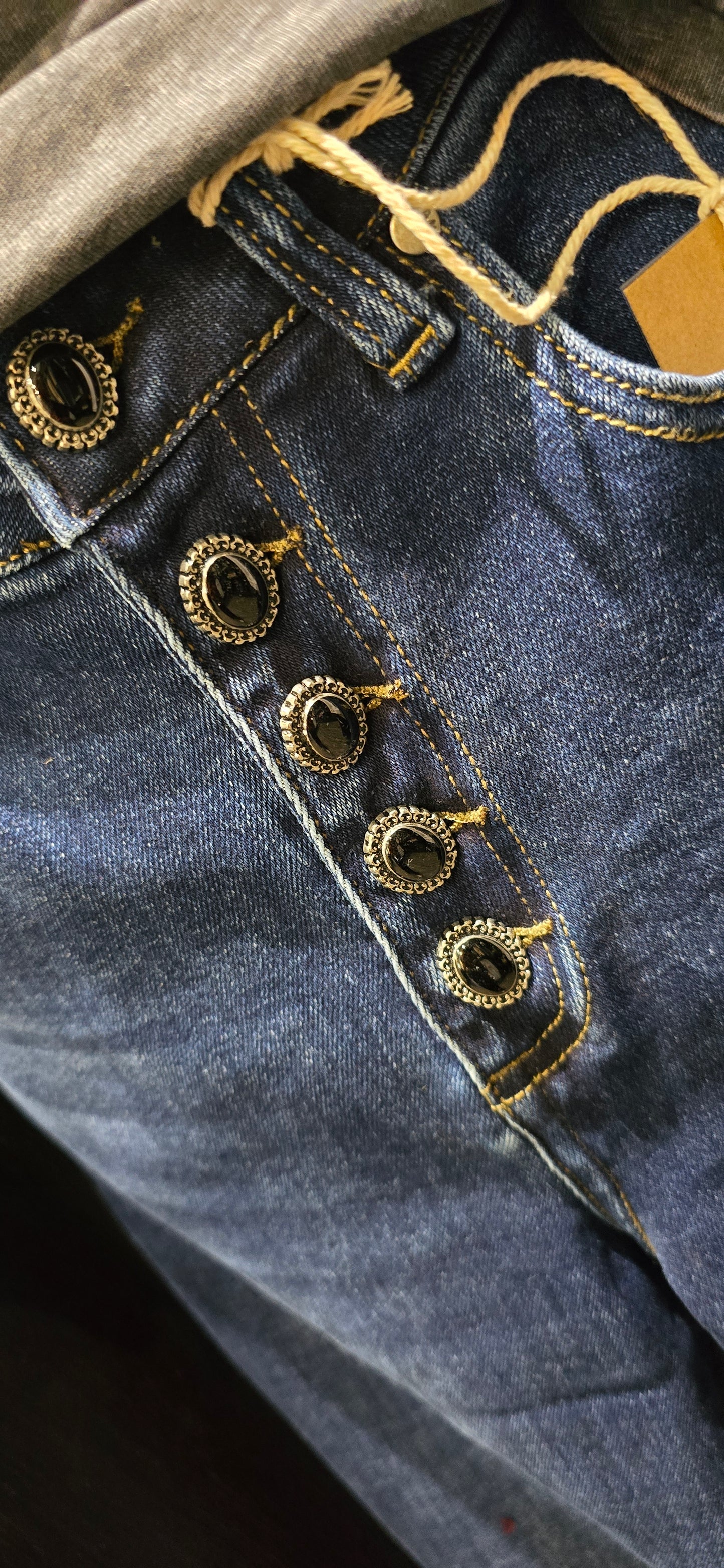 Jeans bottone gioiello