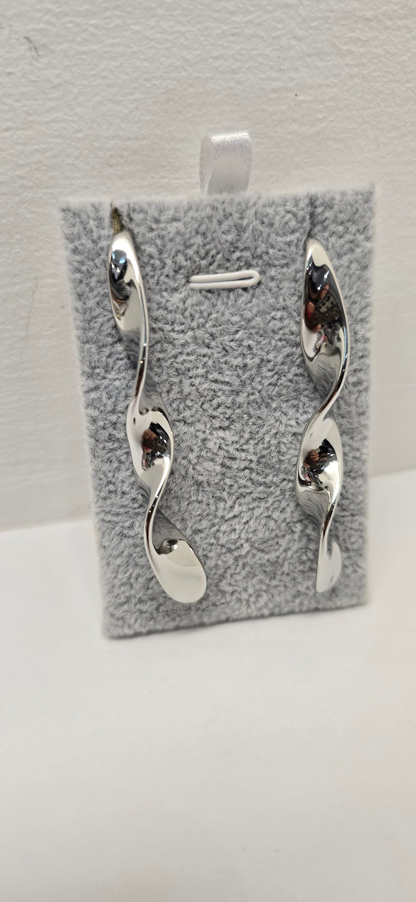 Orecchino spirale acciaio