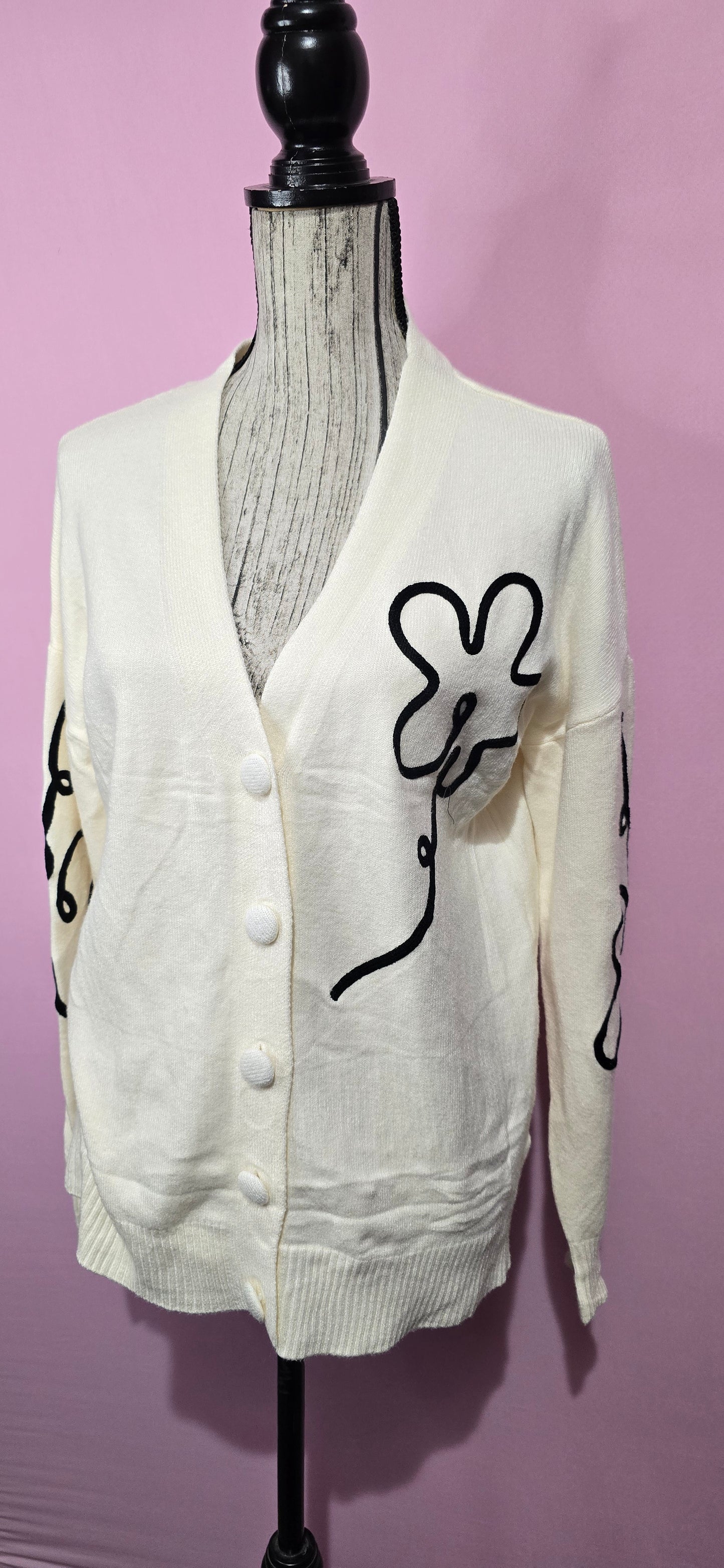 Cardigan fantasia floreale stilizzata panna