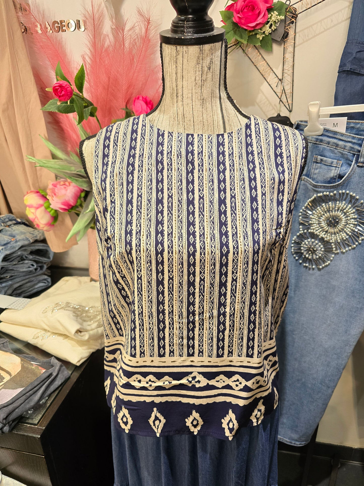 Blusa fantasia con fiocco blu