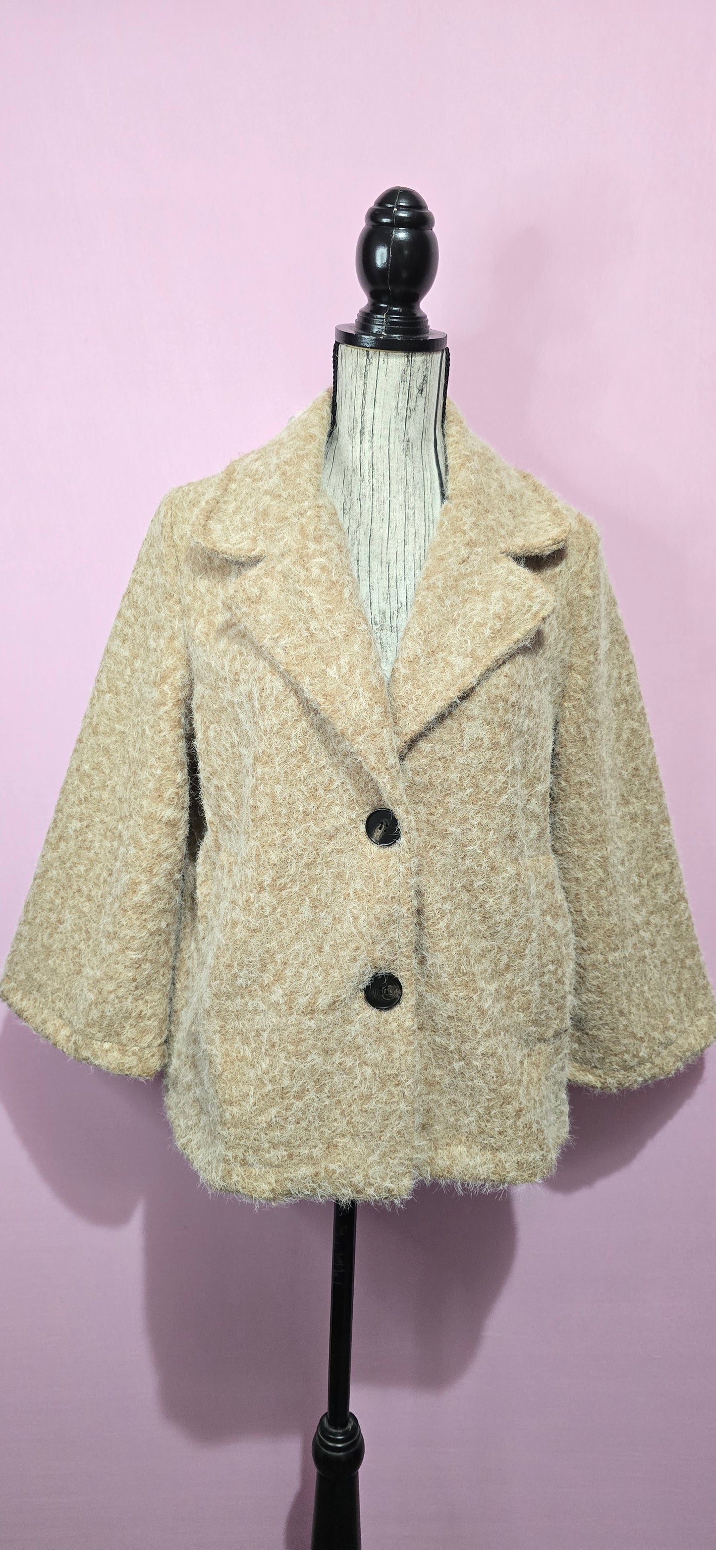 Cappottino corto bouclè camel