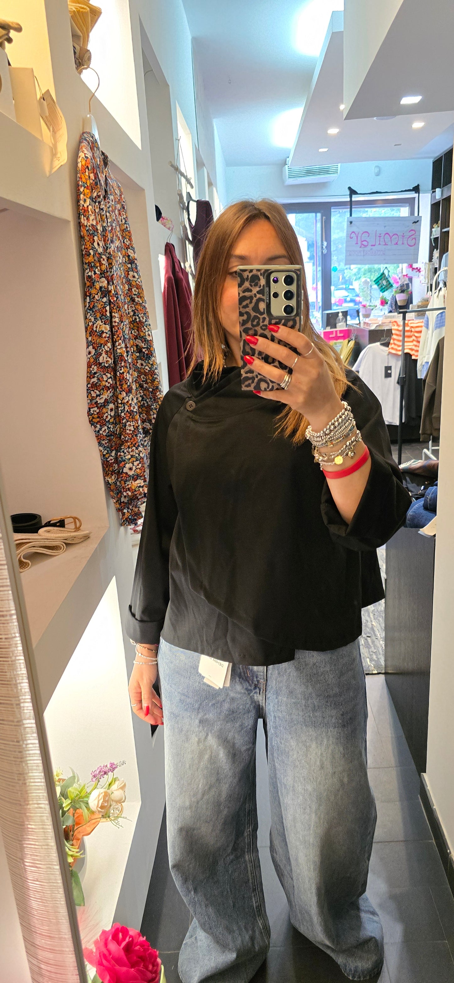 Casacca asimmetrica a portafoglio nero
