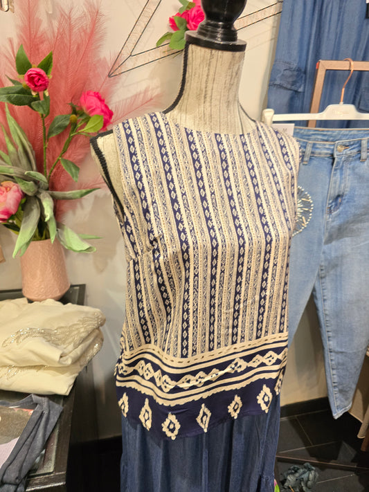 Blusa fantasia con fiocco blu