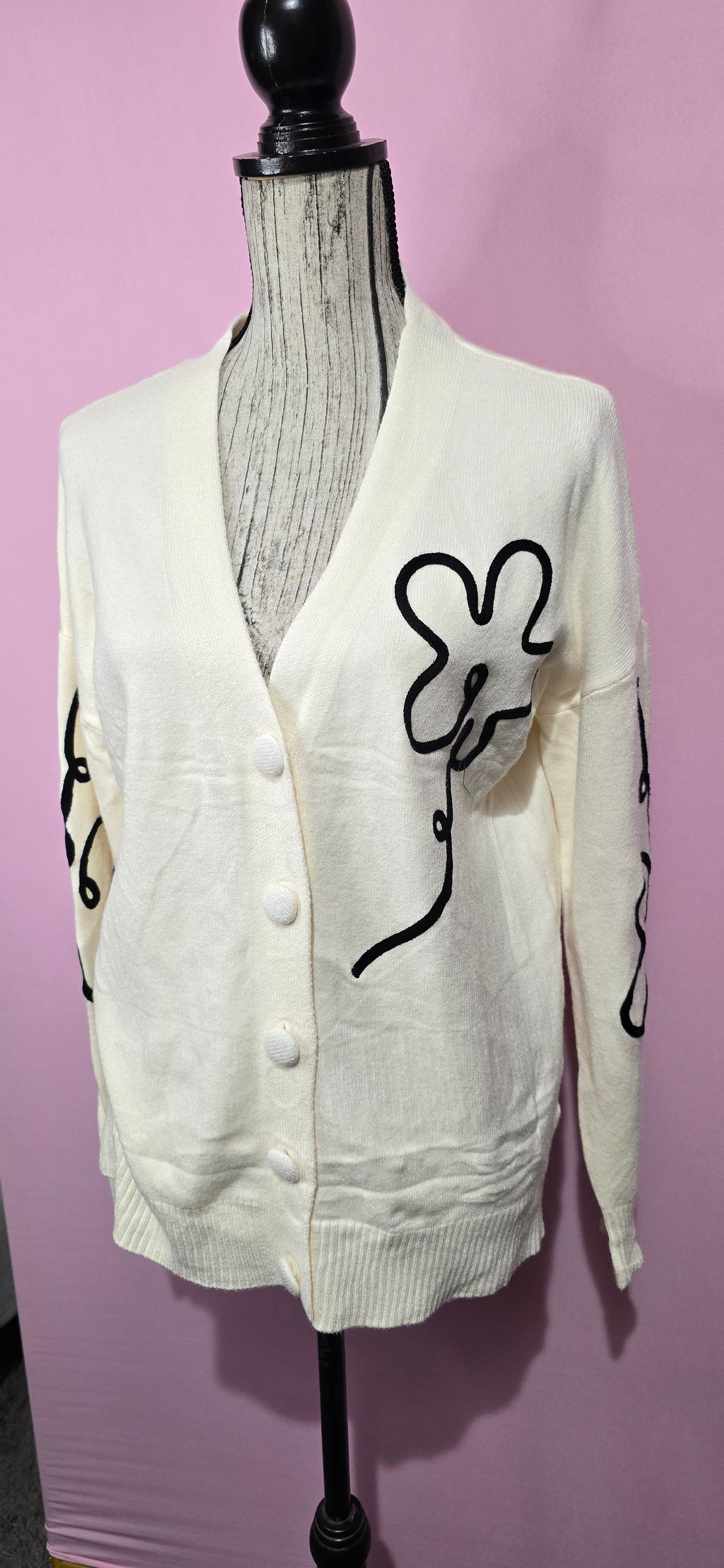 Cardigan fantasia floreale stilizzata panna