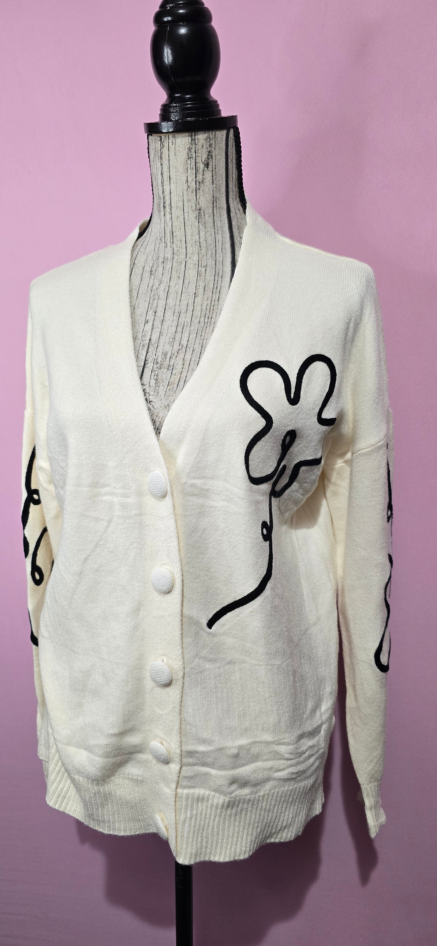 Cardigan fantasia floreale stilizzata panna