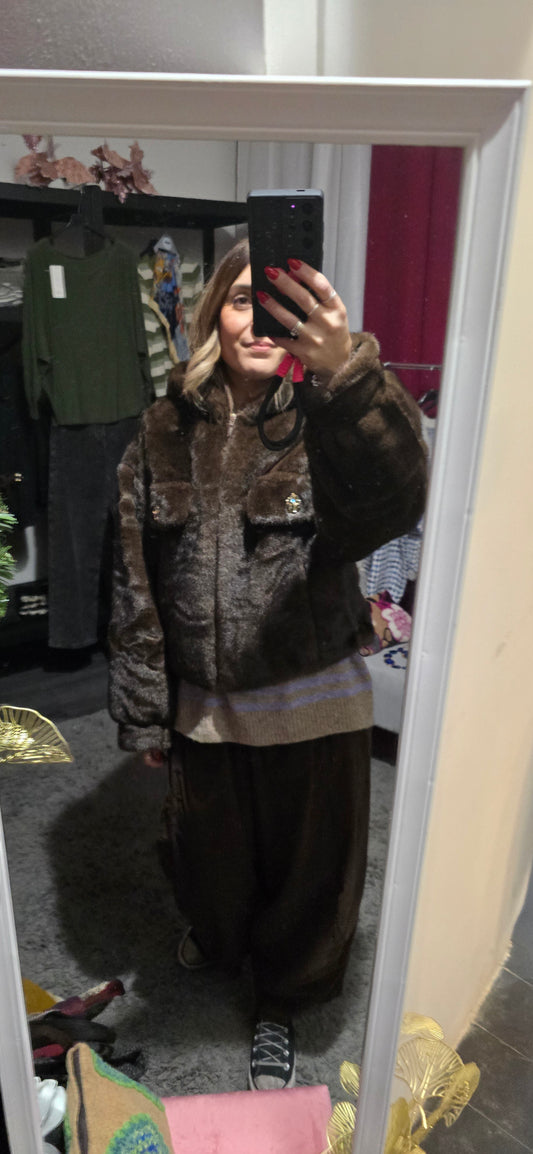 Pellicciotto eco moro con cappuccio